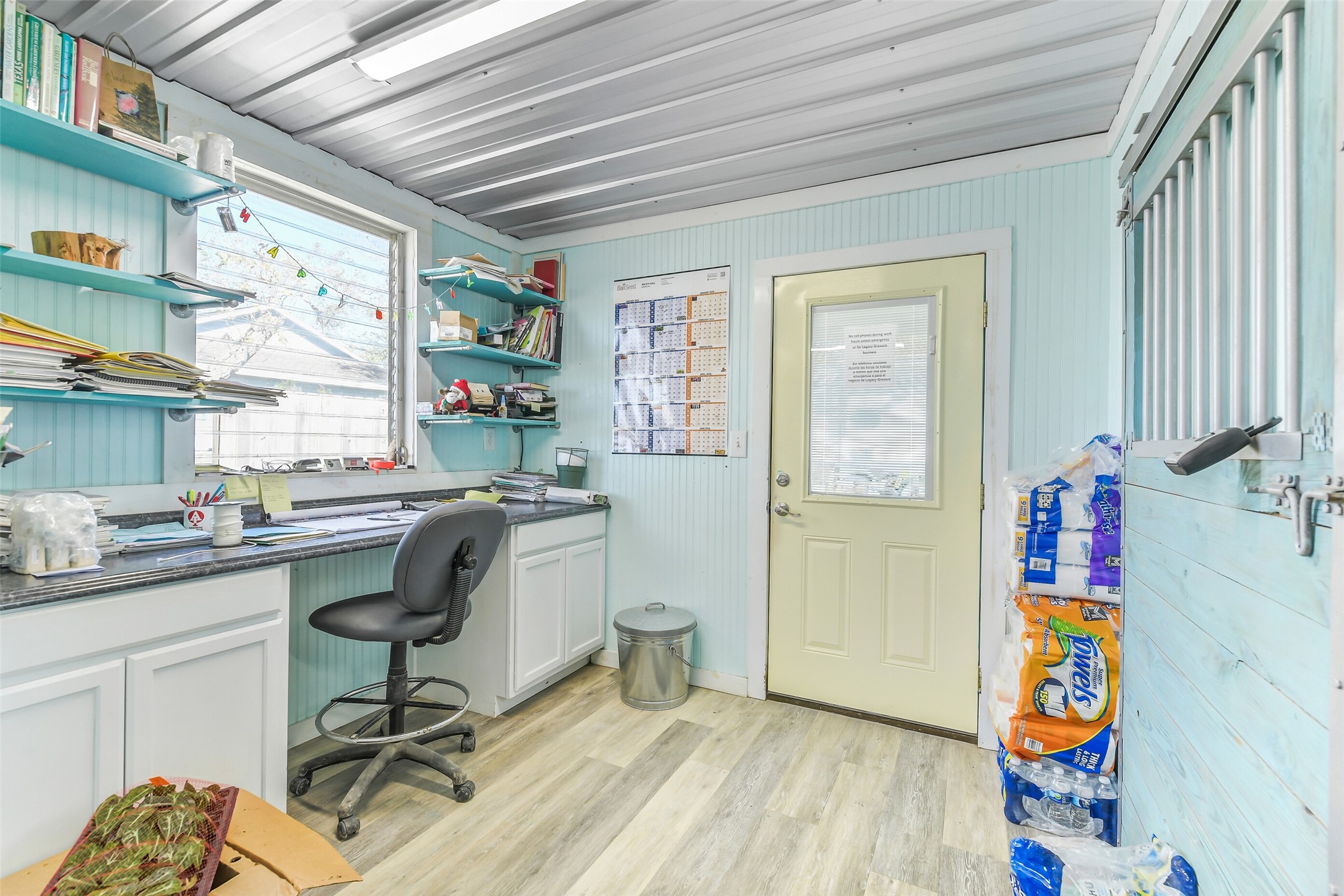 511 West Main Street Weimar, TX 78962 - Photo 11 of 30 a view of a workspace with furniture and a window