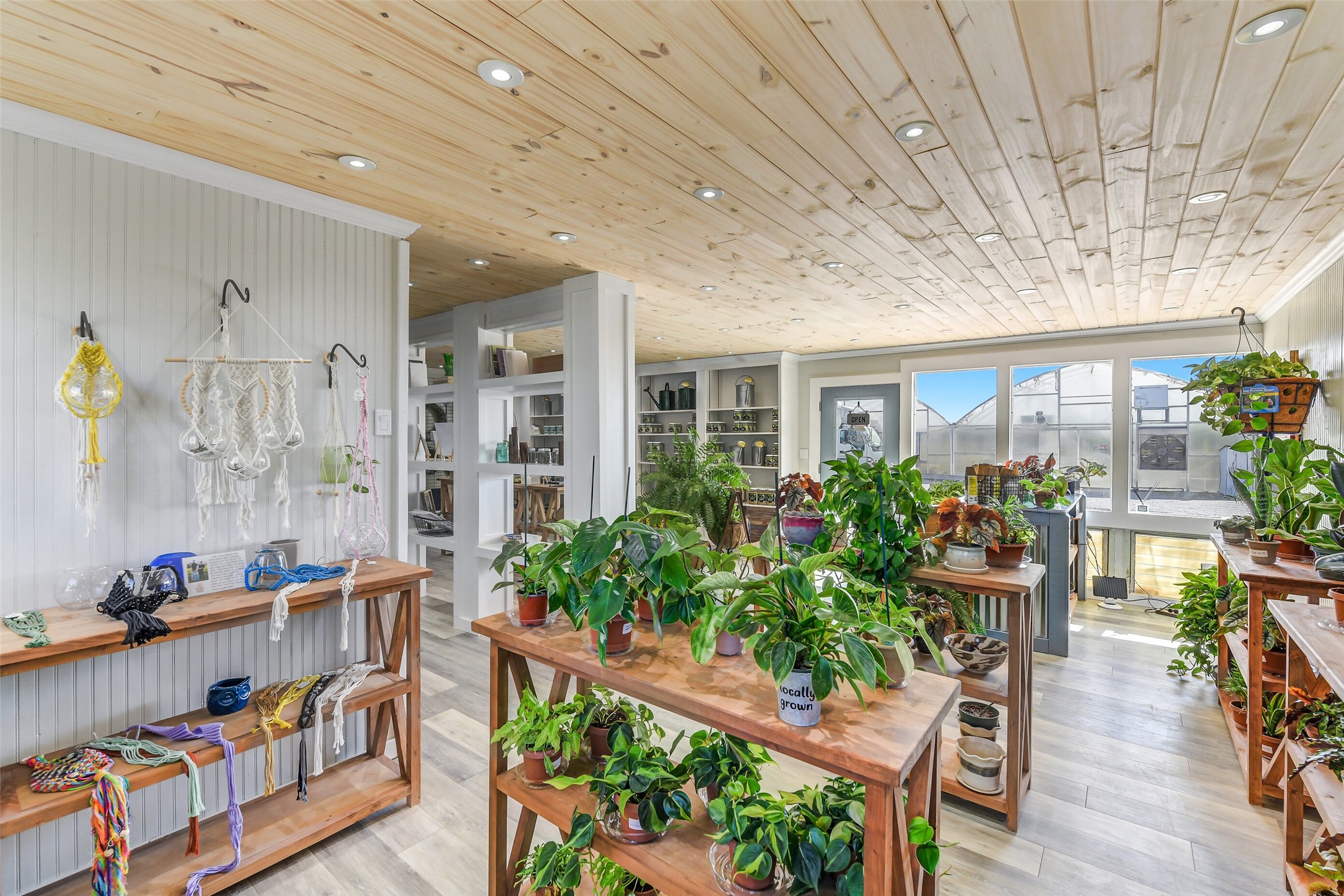 511 West Main Street Weimar, TX 78962 - Photo 8 of 30 a outdoor space with plants and outdoor seating