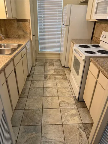 a view of building with garden