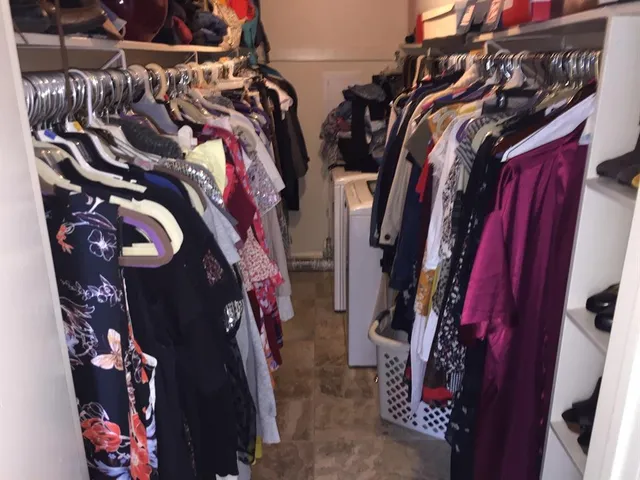 a view of a backyard with chairs and a table