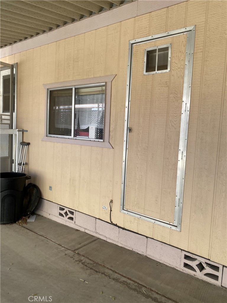 20683 Waalew Road, Unit B161 Apple Valley, CA 92307 - Photo 26 of 30 From Covered Carport - Ramp Entry