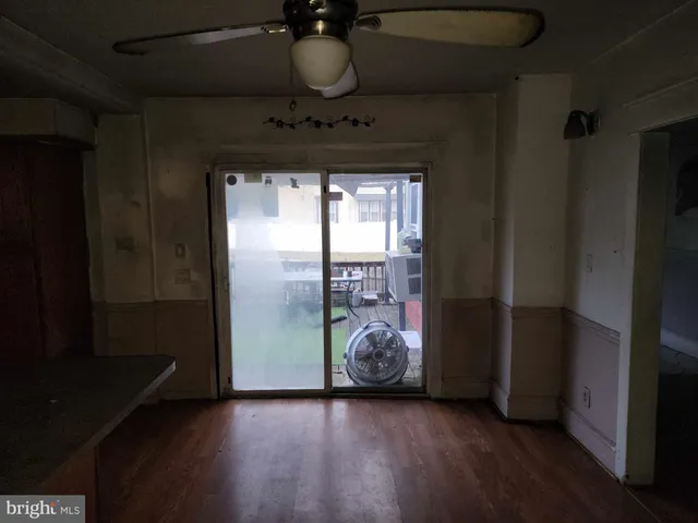 a view of a swimming pool with a deck