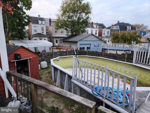 a house view with a backyard space