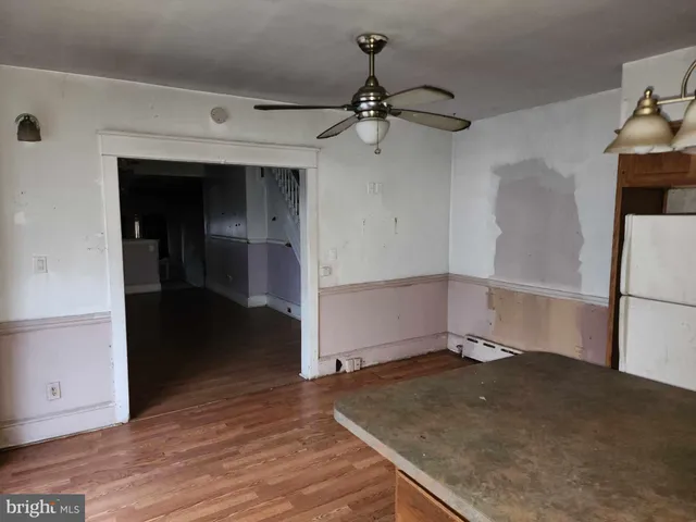 a view of balcony with wooden floor