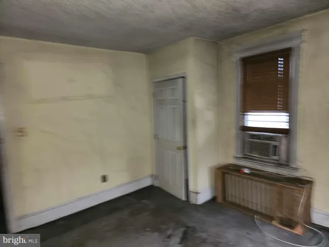 a bathroom with a sink toilet and mirror