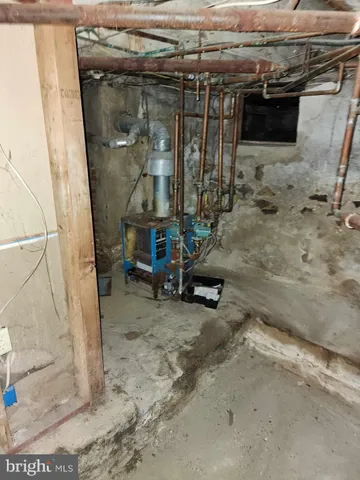 a view of a hallway with seating area