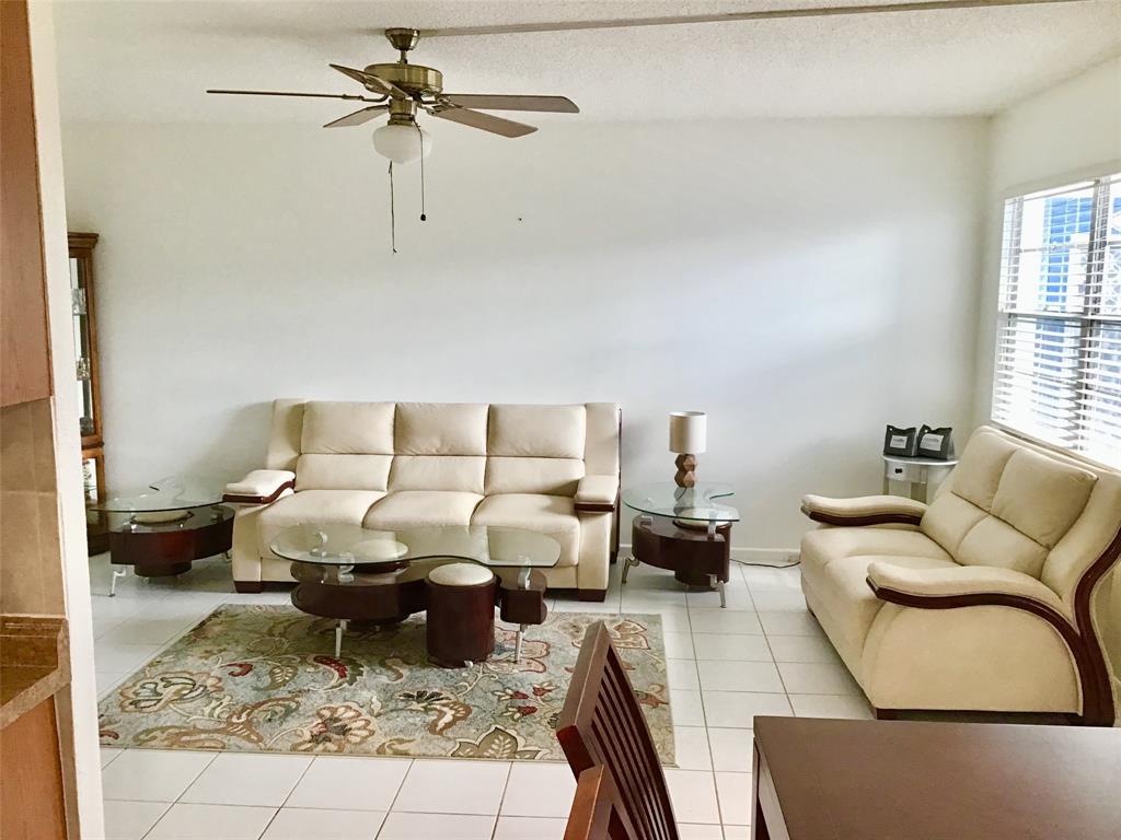 2038 Exeter C, Unit 2038 Boca Raton, FL 33434 - Photo 11 of 37 a living room with furniture