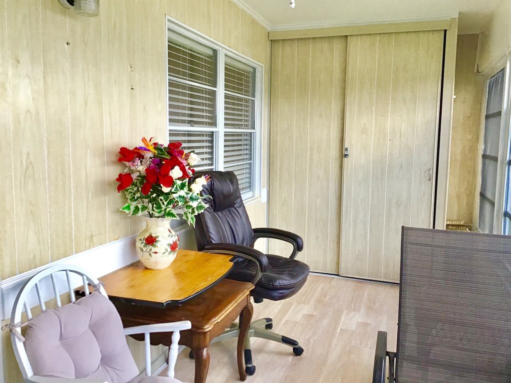 2038 Exeter C, Unit 2038 Boca Raton, FL 33434 - Photo 28 of 37 a view of a dining room with furniture and window
