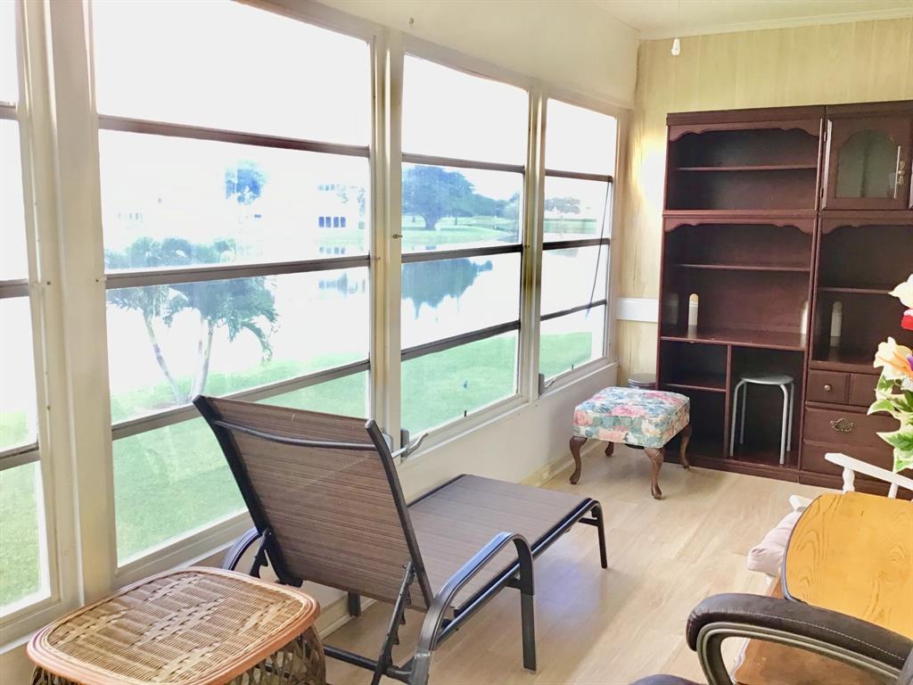 2038 Exeter C, Unit 2038 Boca Raton, FL 33434 - Photo 30 of 37 a living room with furniture