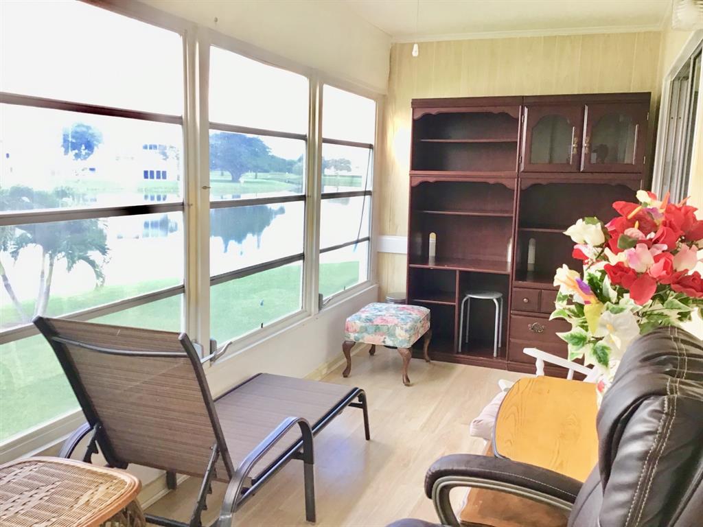 2038 Exeter C, Unit 2038 Boca Raton, FL 33434 - Photo 31 of 37 a living room with furniture