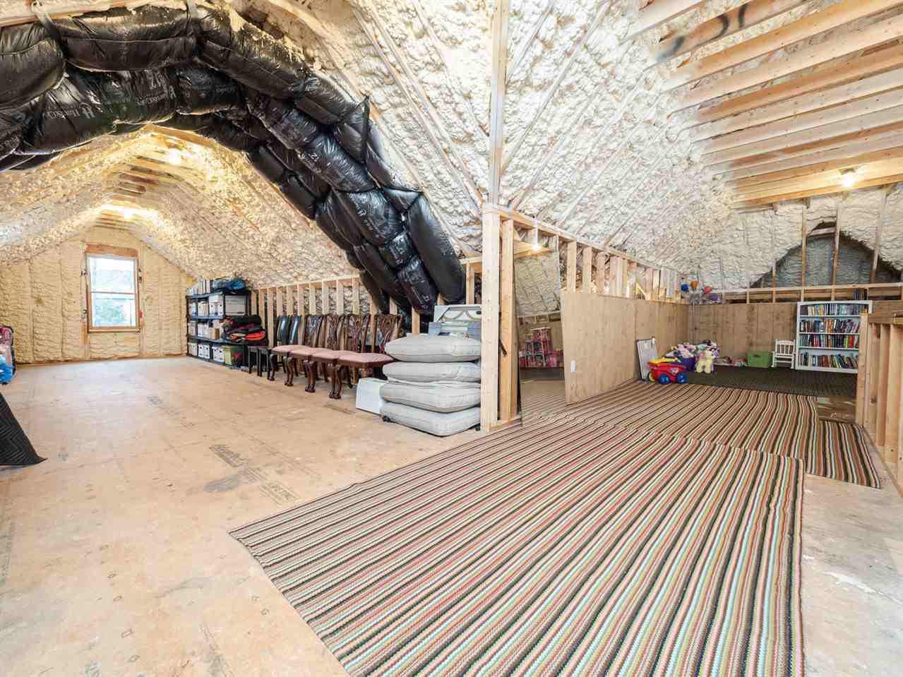 3309 Thomas Road Raleigh, NC 27607 - Photo 26 of 30 This oversized walk up attic features Spray Foam Insulation which creates a comfortable attic space, and the elevator shaft goes all the way up! Walk-Up Attic