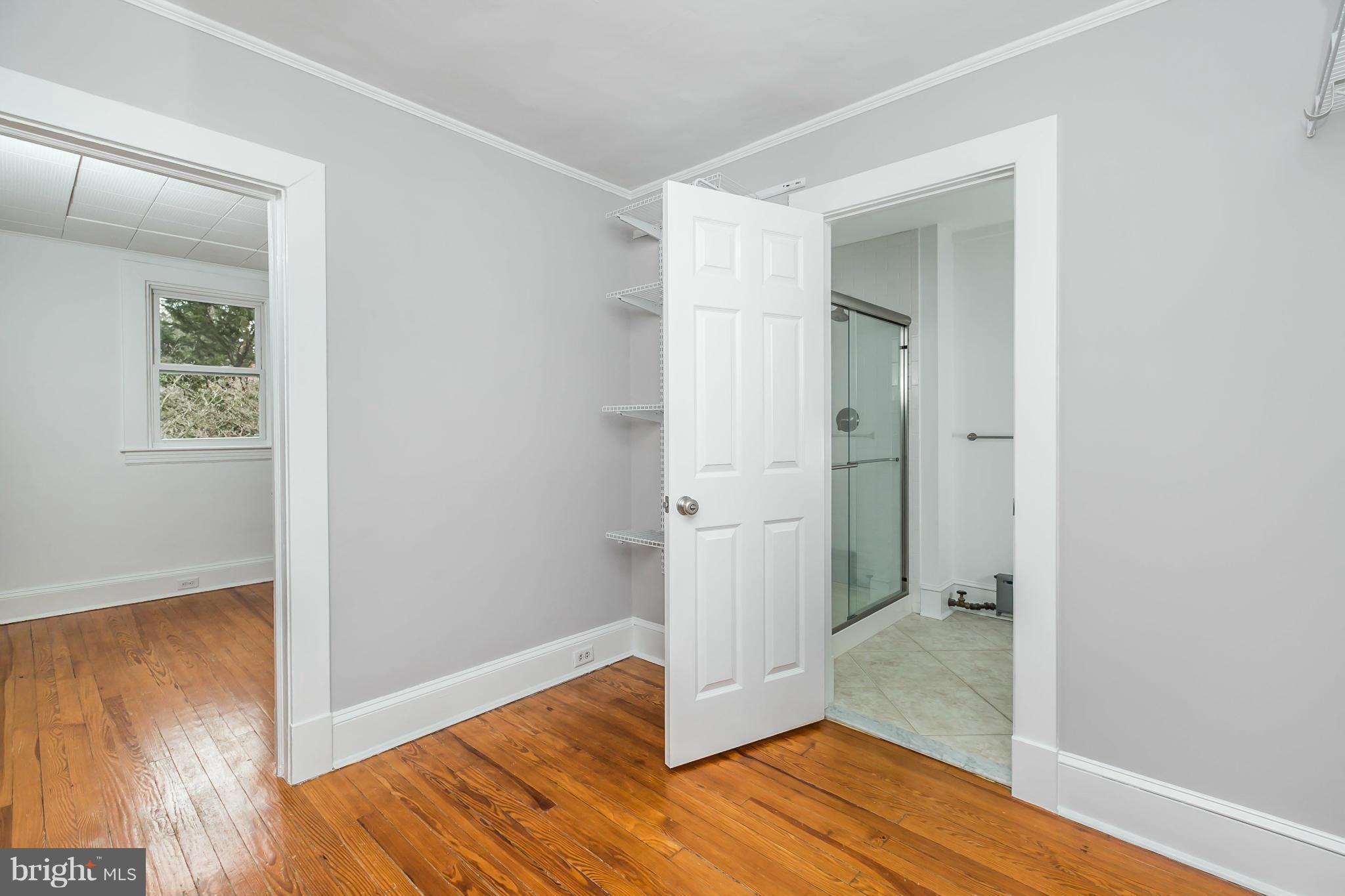 621 Deepdene Road Baltimore, MD 21210 - Photo 17 of 27 a view of a hallway with wooden floor and closet