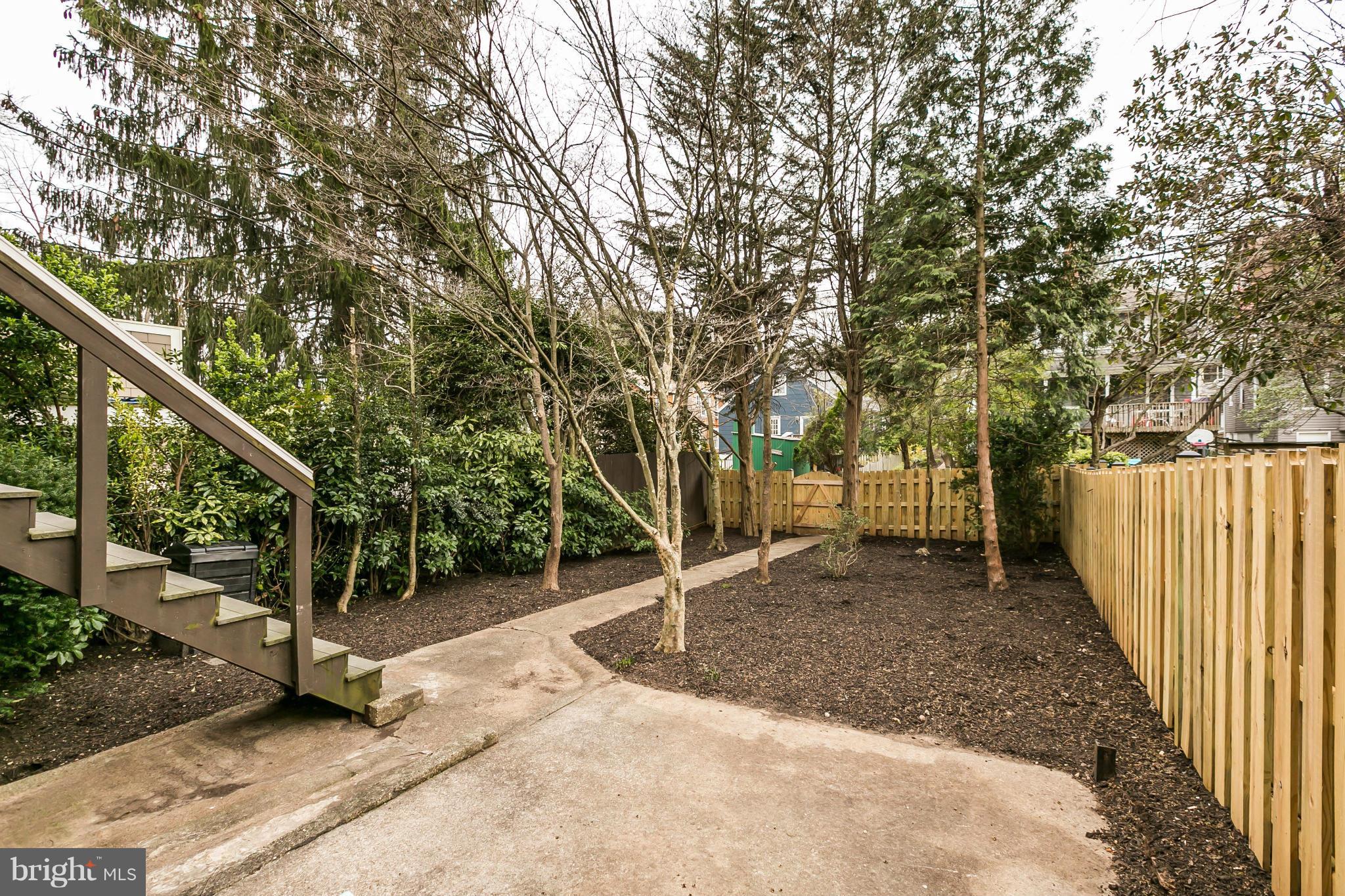 621 Deepdene Road Baltimore, MD 21210 - Photo 24 of 27 a view of a backyard with large trees