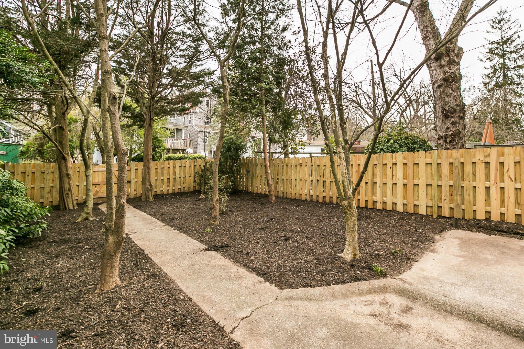 621 Deepdene Road Baltimore, MD 21210 - Photo 25 of 27 a view of a backyard with trees