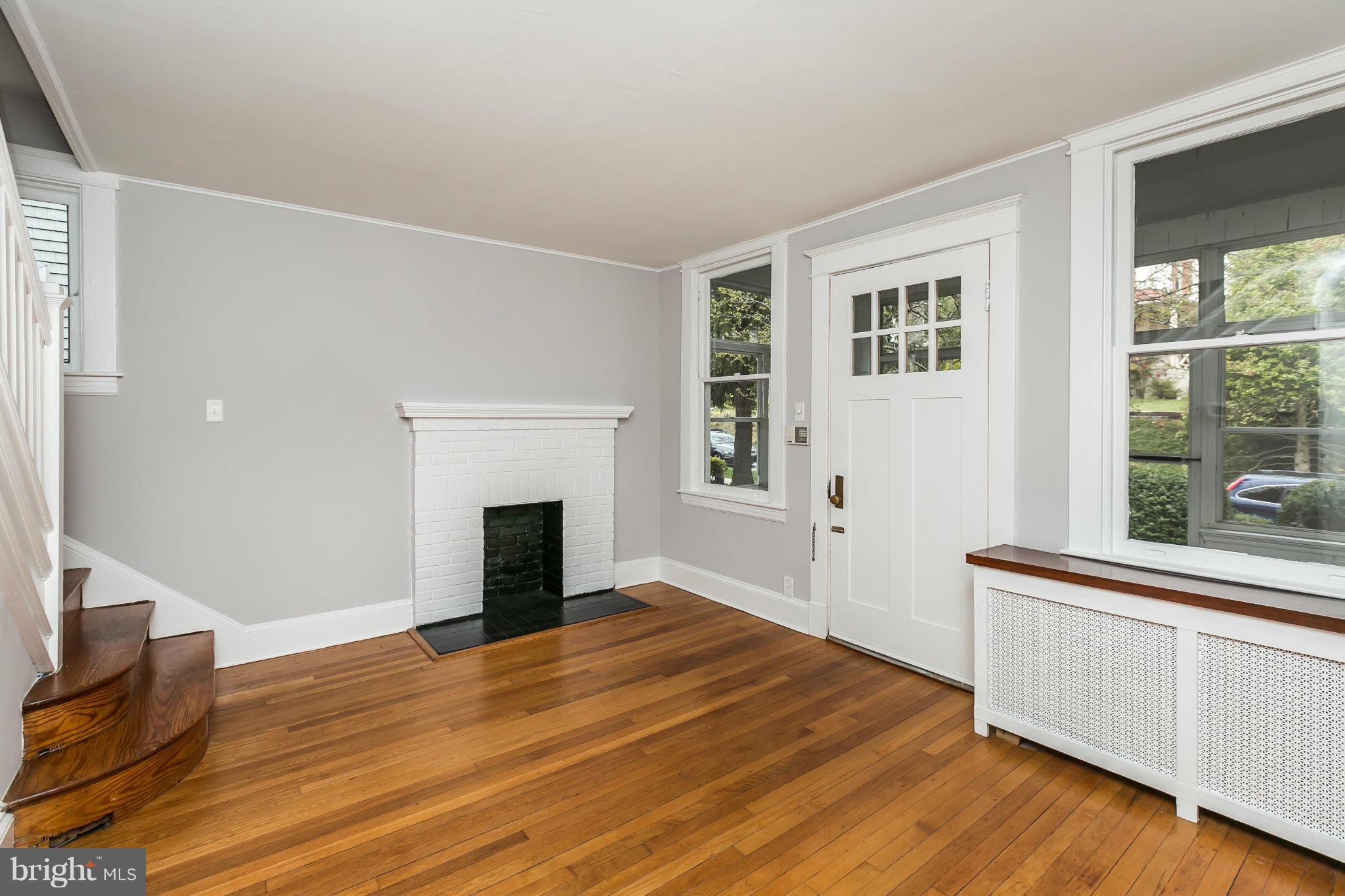 621 Deepdene Road Baltimore, MD 21210 - Photo 5 of 27 a view of empty room with wooden floor and fan