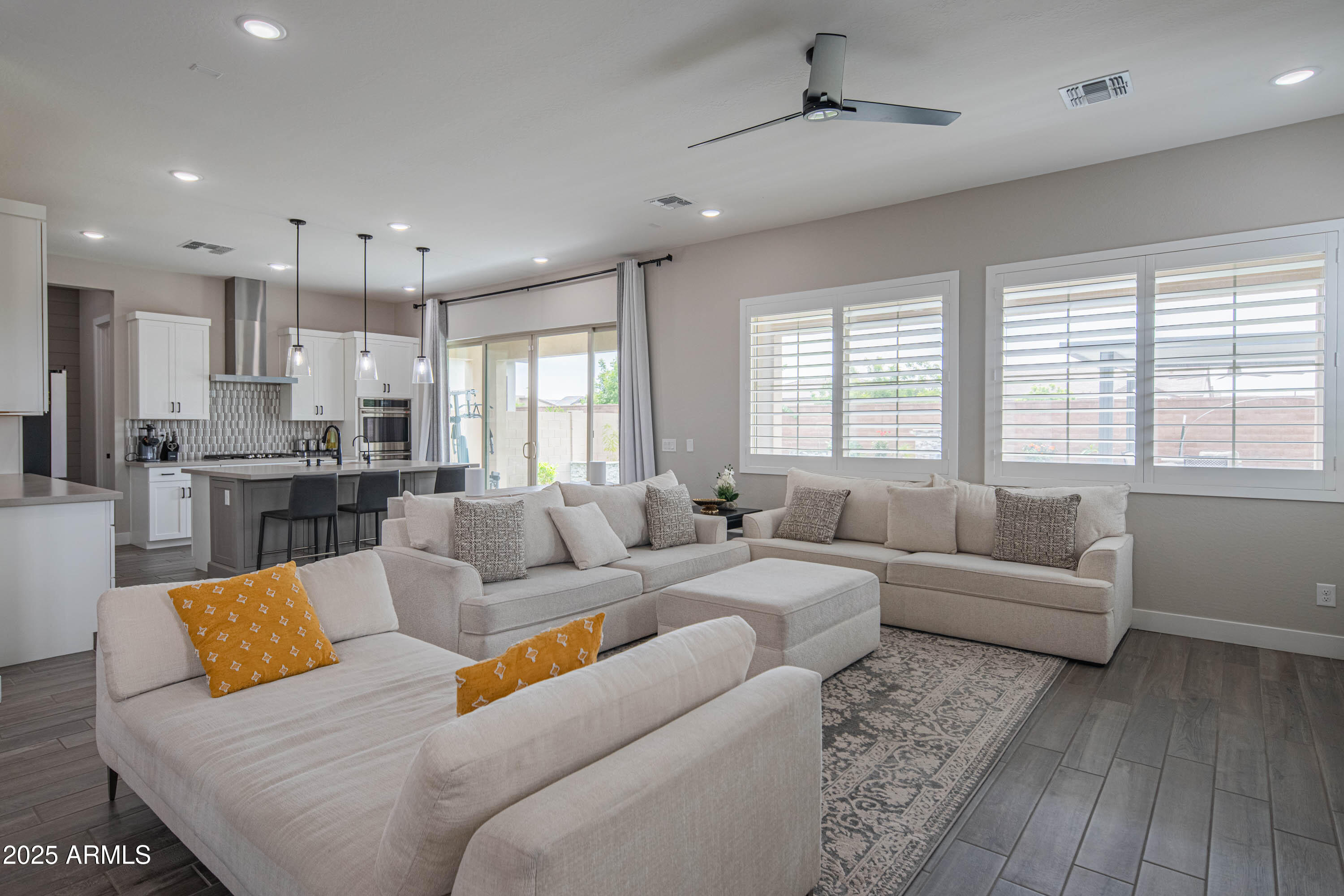 5232 South Cobblestone Street Gilbert, AZ 85298 - Photo 14 of 71 a living room with furniture and a large window