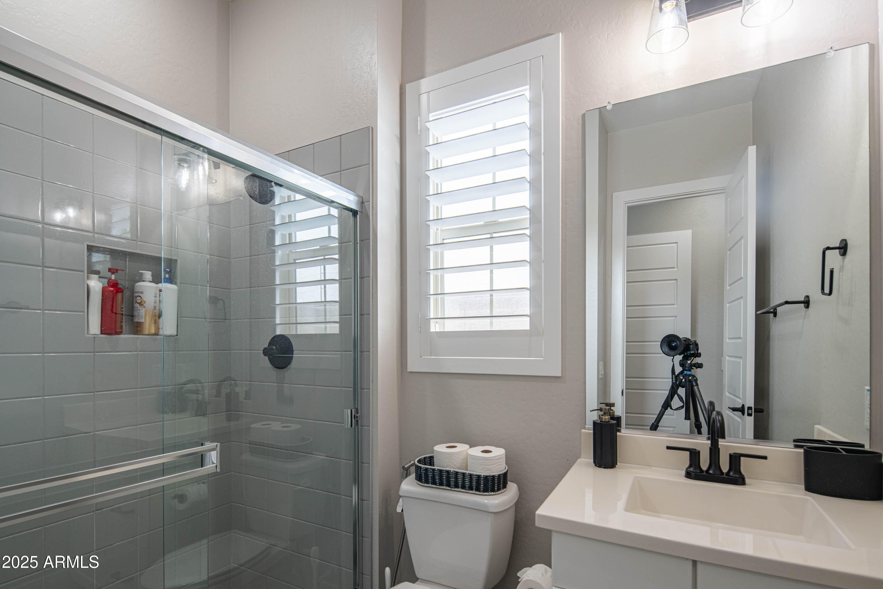 5232 South Cobblestone Street Gilbert, AZ 85298 - Photo 26 of 71 a bathroom with a sink a toilet and shower