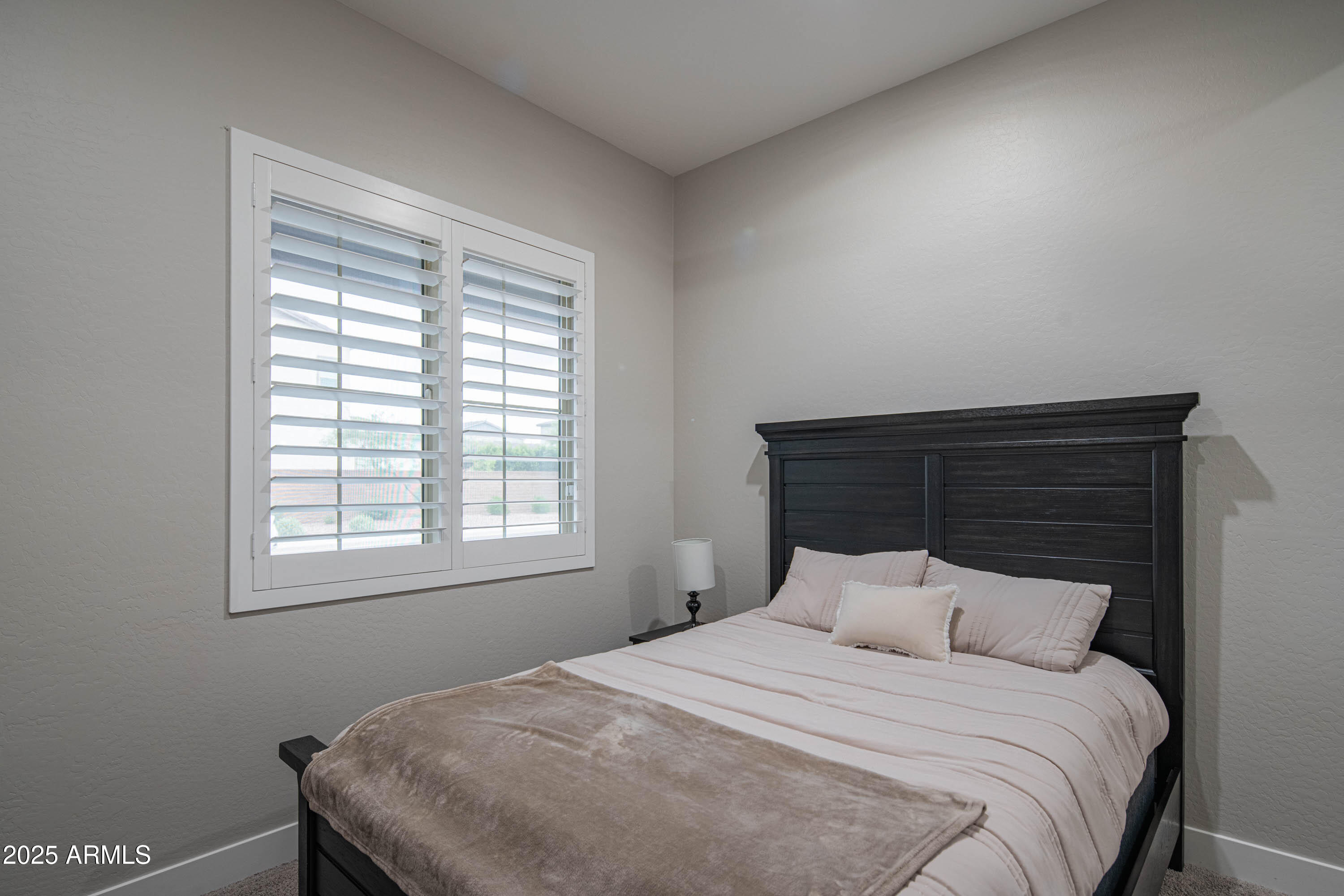 5232 South Cobblestone Street Gilbert, AZ 85298 - Photo 28 of 71 a bedroom with a bed and window