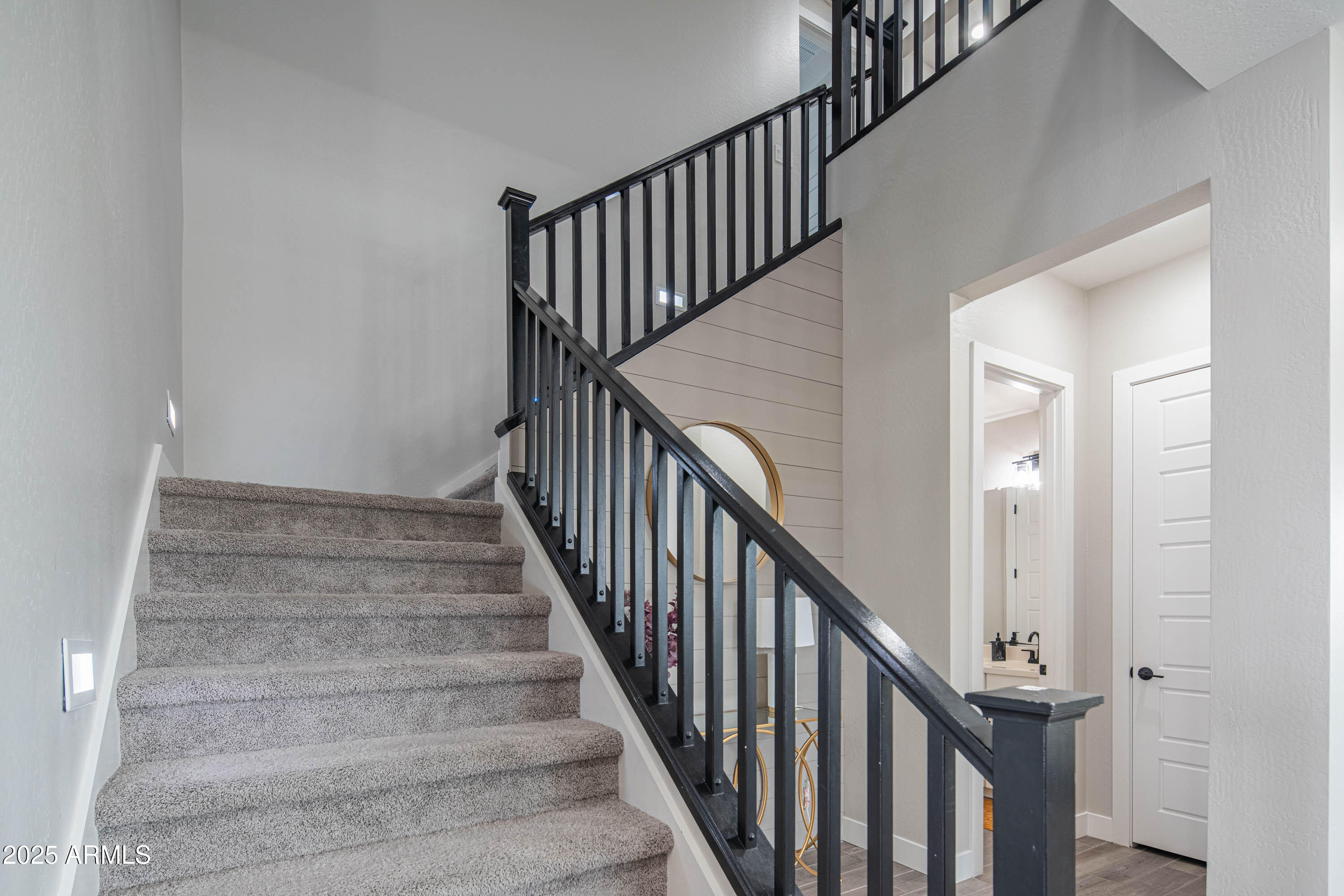 5232 South Cobblestone Street Gilbert, AZ 85298 - Photo 29 of 71 a view of staircase with railing and white walls