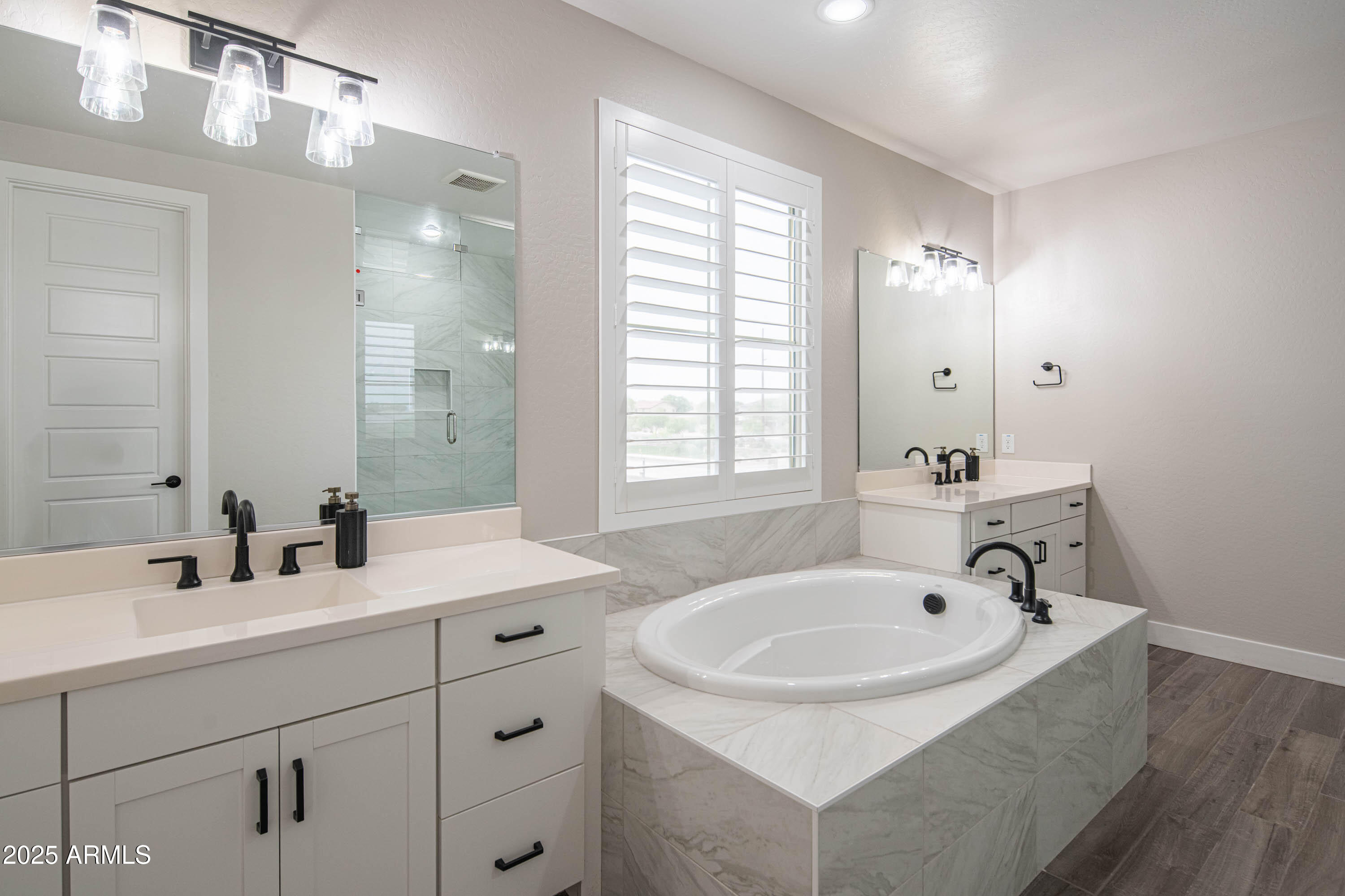 5232 South Cobblestone Street Gilbert, AZ 85298 - Photo 35 of 71 a bathroom with double sink and a mirror