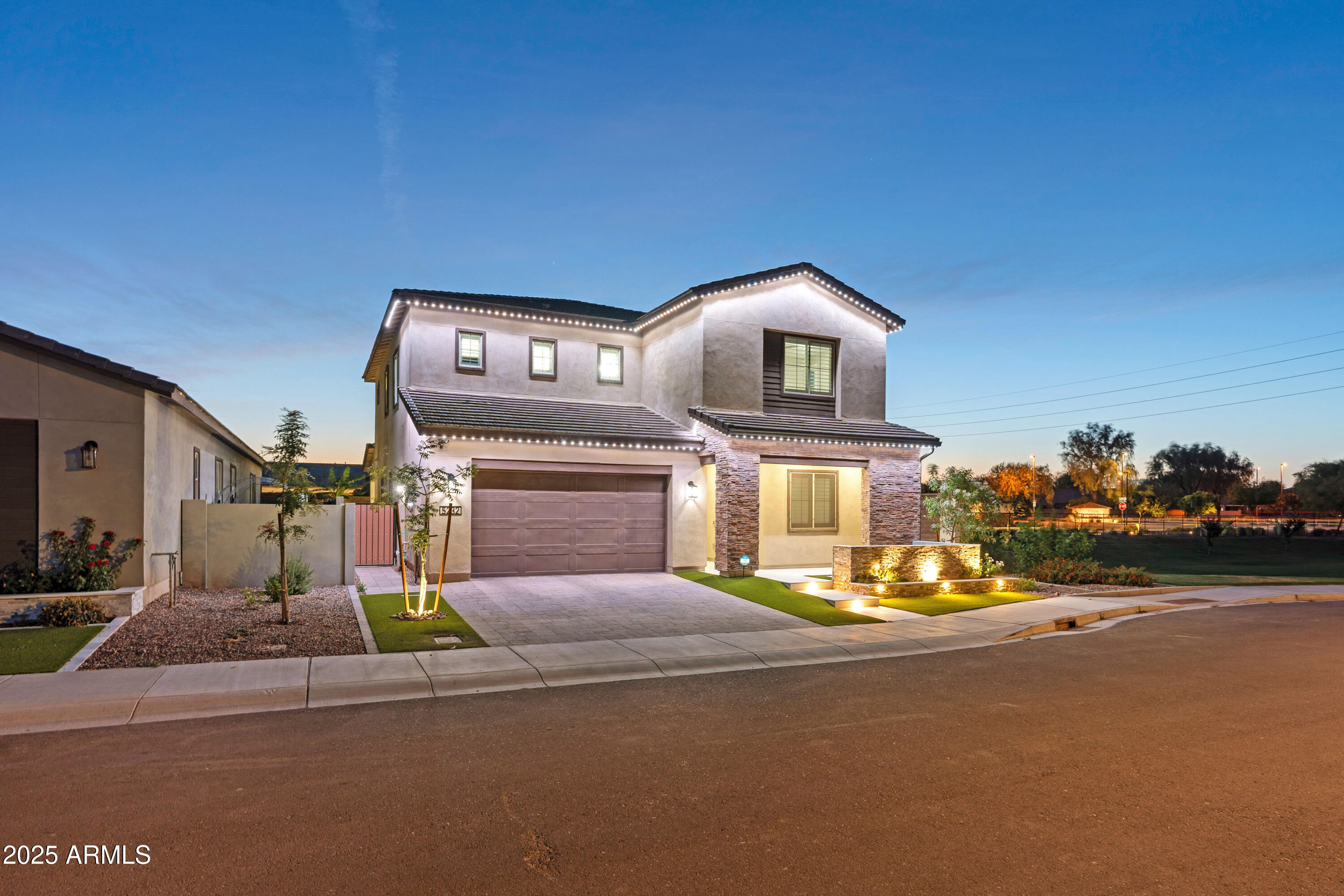 5232 South Cobblestone Street Gilbert, AZ 85298 - Photo 4 of 71 a view of a house with a street