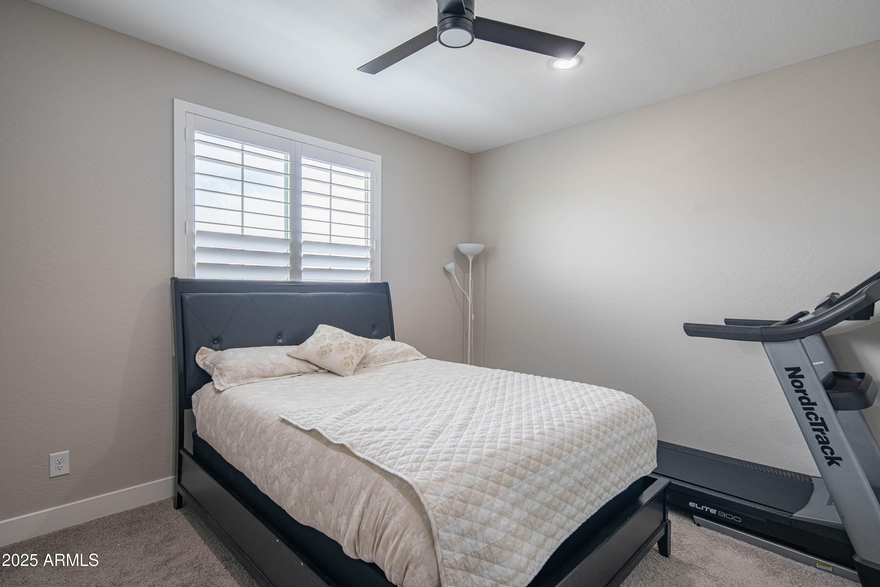 5232 South Cobblestone Street Gilbert, AZ 85298 - Photo 42 of 71 a bedroom with a bed and a window