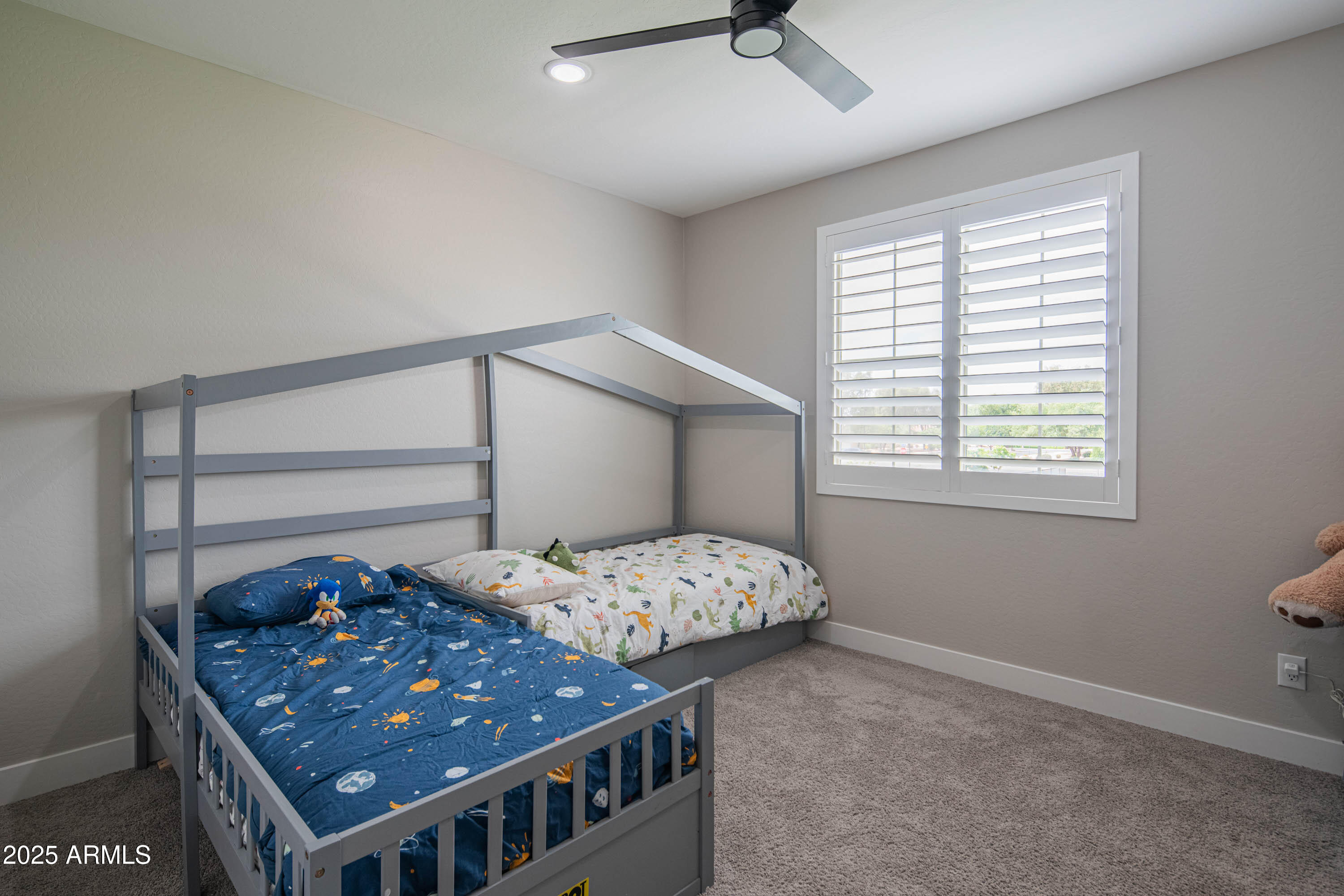 5232 South Cobblestone Street Gilbert, AZ 85298 - Photo 44 of 71 a bedroom with a bed and window