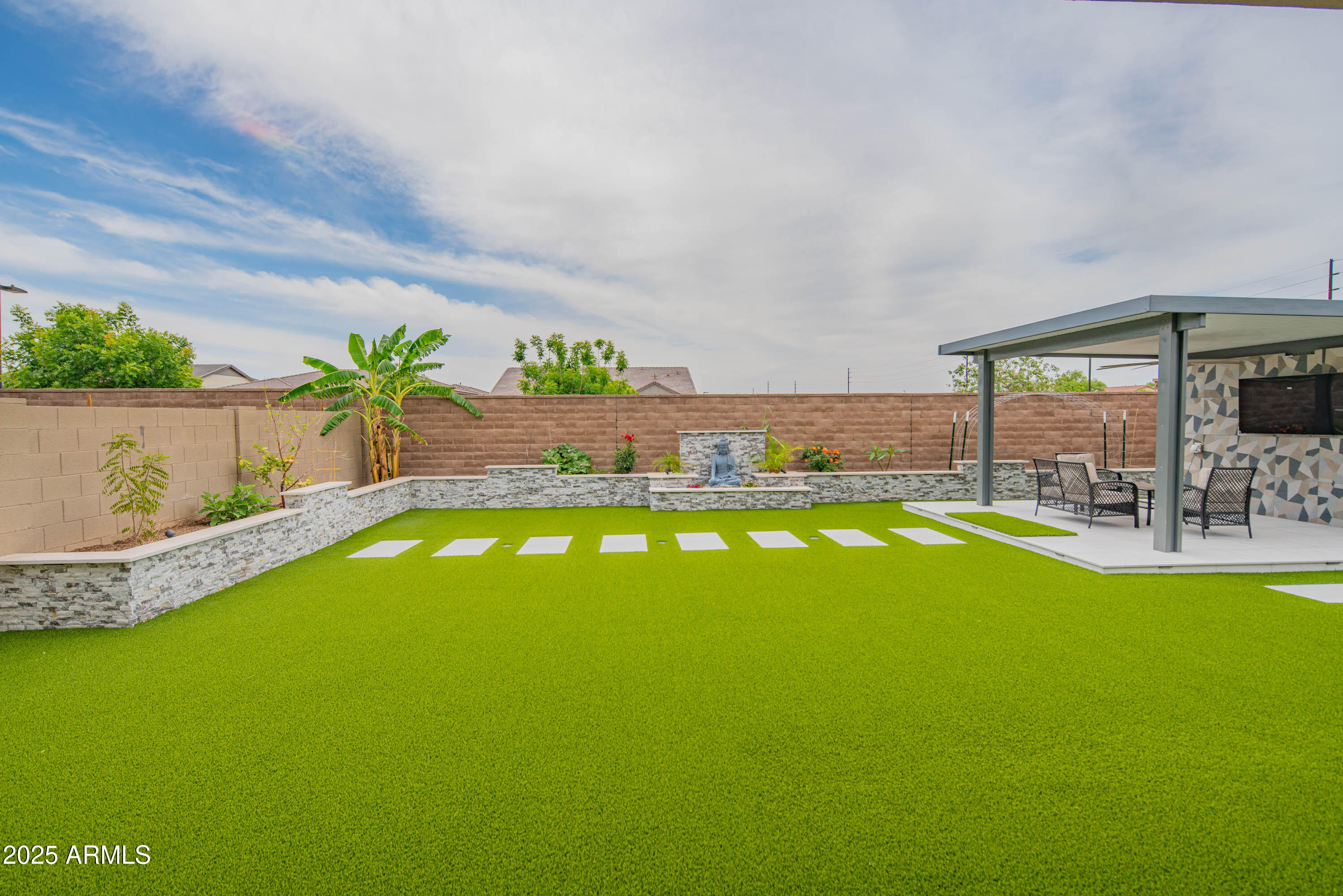 5232 South Cobblestone Street Gilbert, AZ 85298 - Photo 51 of 71 a view of a house with a swimming pool