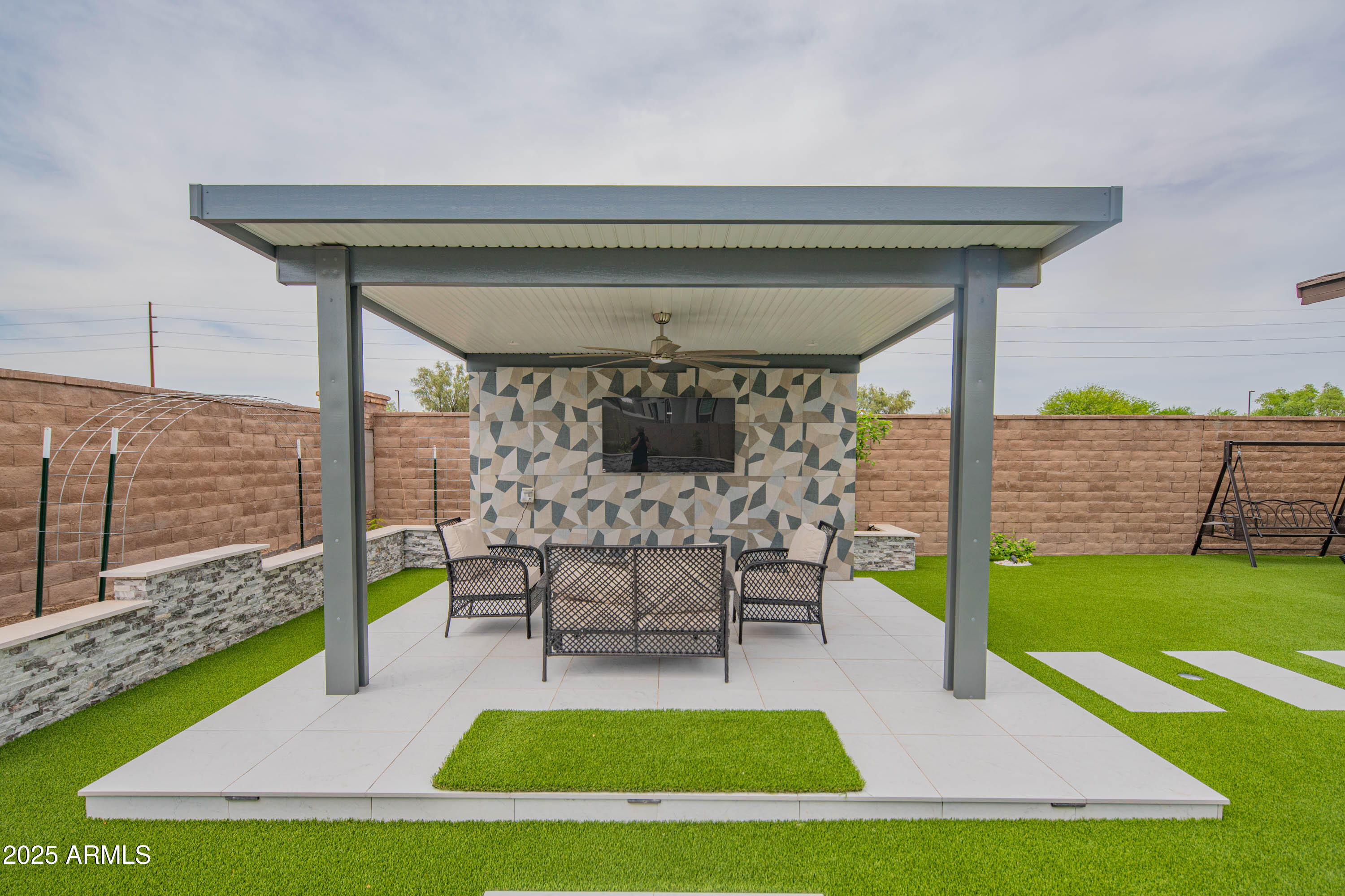 5232 South Cobblestone Street Gilbert, AZ 85298 - Photo 59 of 71 a view of outdoor space yard deck patio and outdoor kitchen