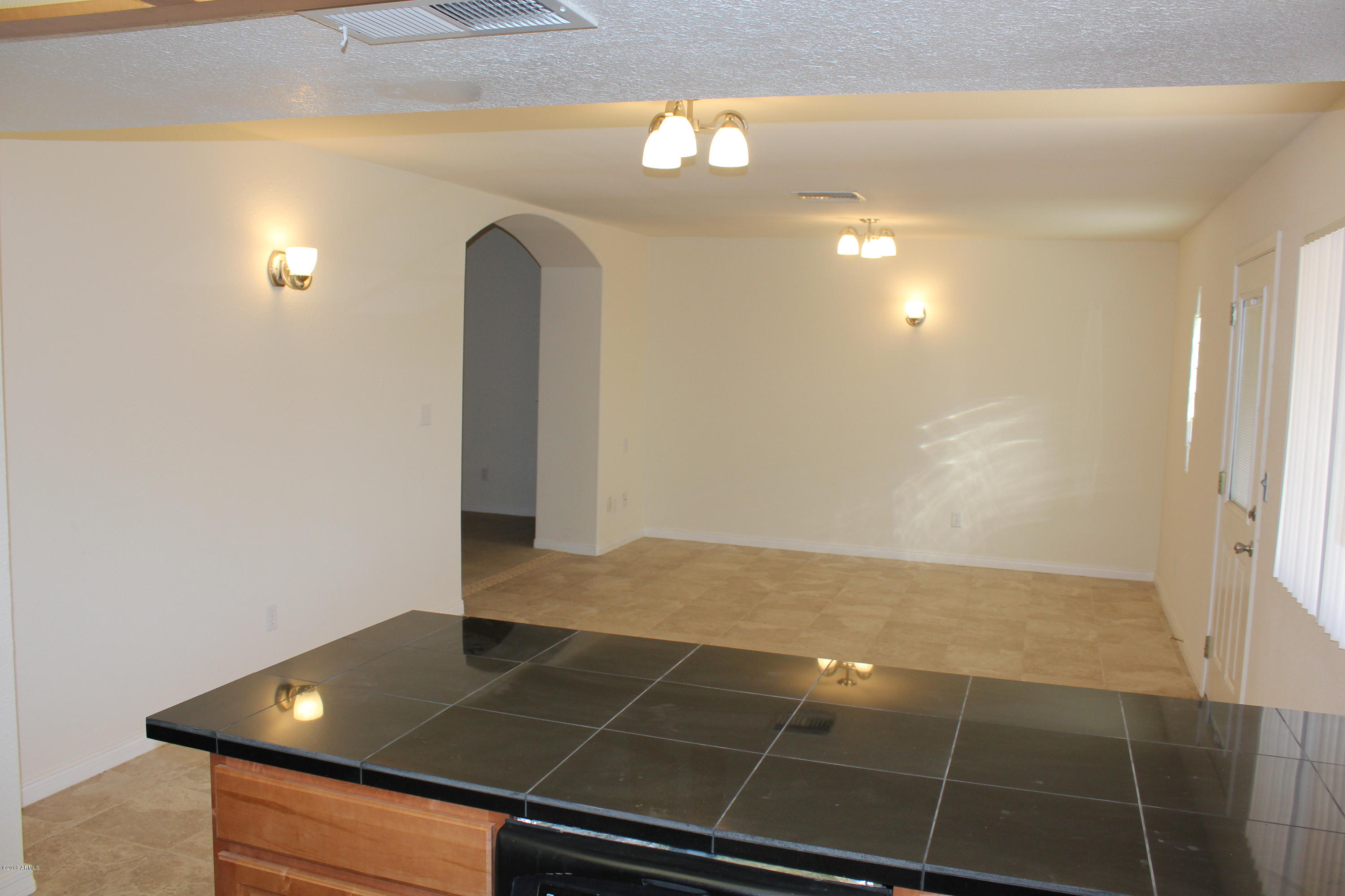 4641 West Calavar Road Glendale, AZ 85306 - Photo 12 of 31 Kitchen Dining room