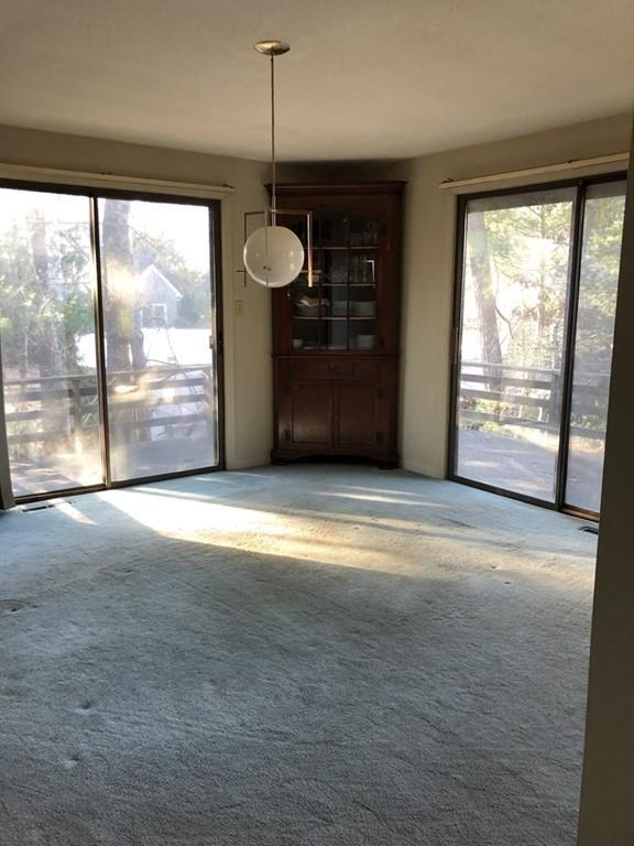 37 Summersea Road Mashpee, MA 02649 - Photo 8 of 16 a view of a room with wooden floor and a large window