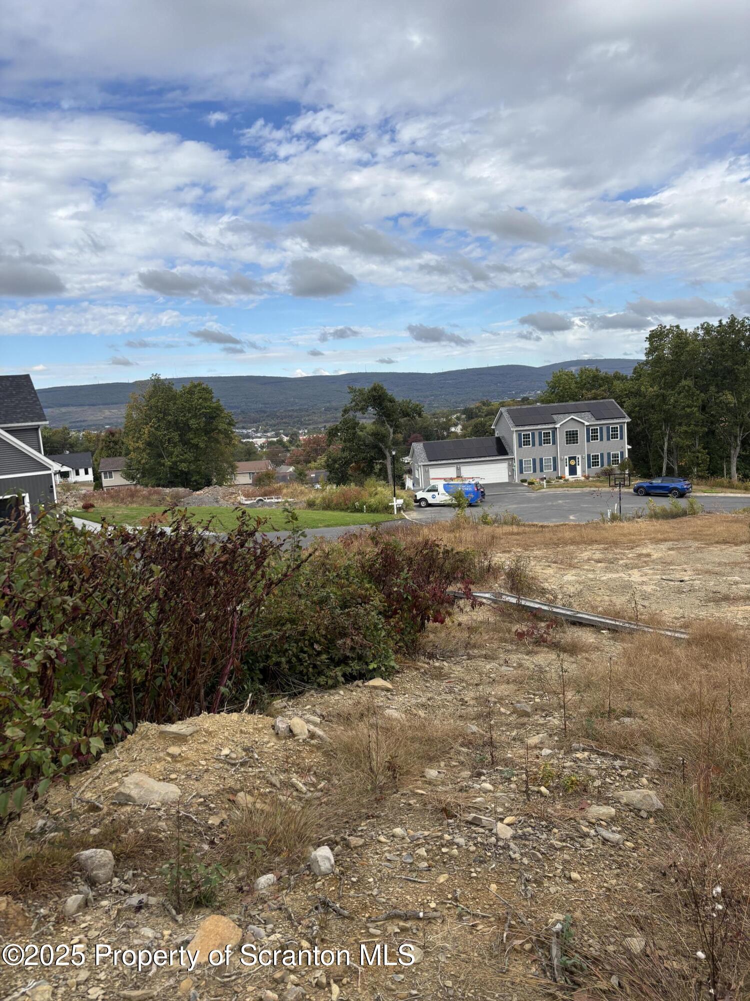 Lot # Railroad Street Moosic, PA 18507 - Photo 6 of 15 a view of a beach with a yard