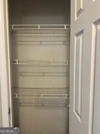 a room with storage and utility