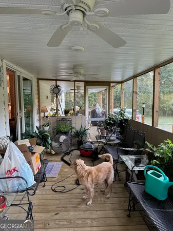 a view of a porch with furniture