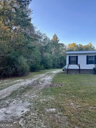 a view of a forest with trees