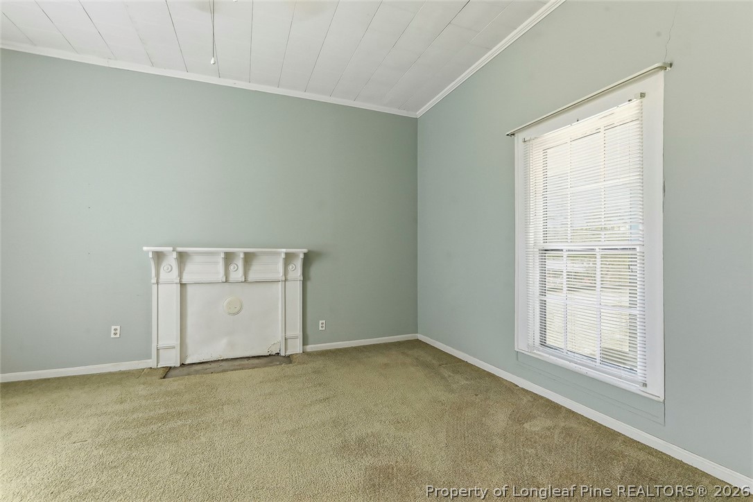 249 Nicholson Road Rockingham, NC 28379 - Photo 11 of 47 an empty room with windows