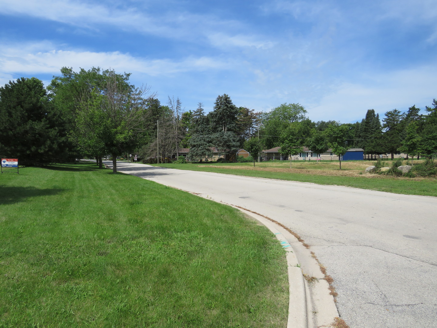 Undisclosed Address Joliet, IL 60436 - Photo 2 of 8 a view of a golf course with a lake