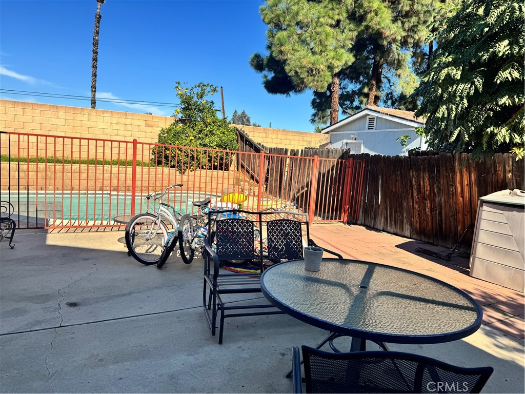 10535 Salisbury Drive Riverside, CA 92503 - Photo 3 of 3 a backyard of a house with table and chairs