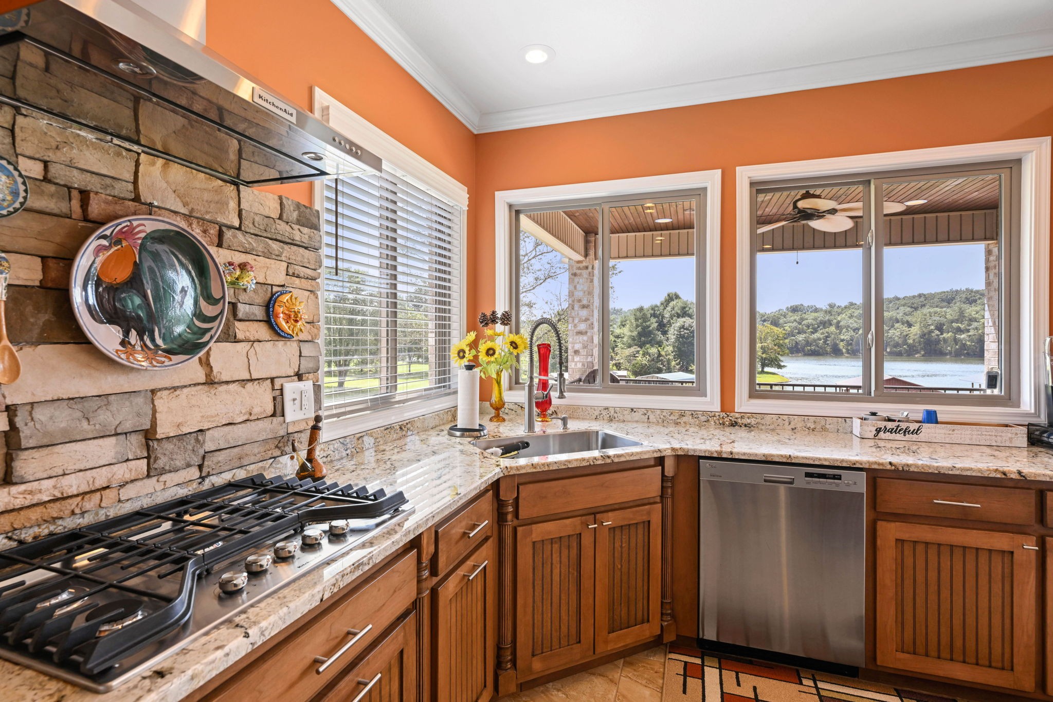 850 Sable Road Spring City, TN 37381 - Photo 11 of 56 a kitchen that has a sink and a stove