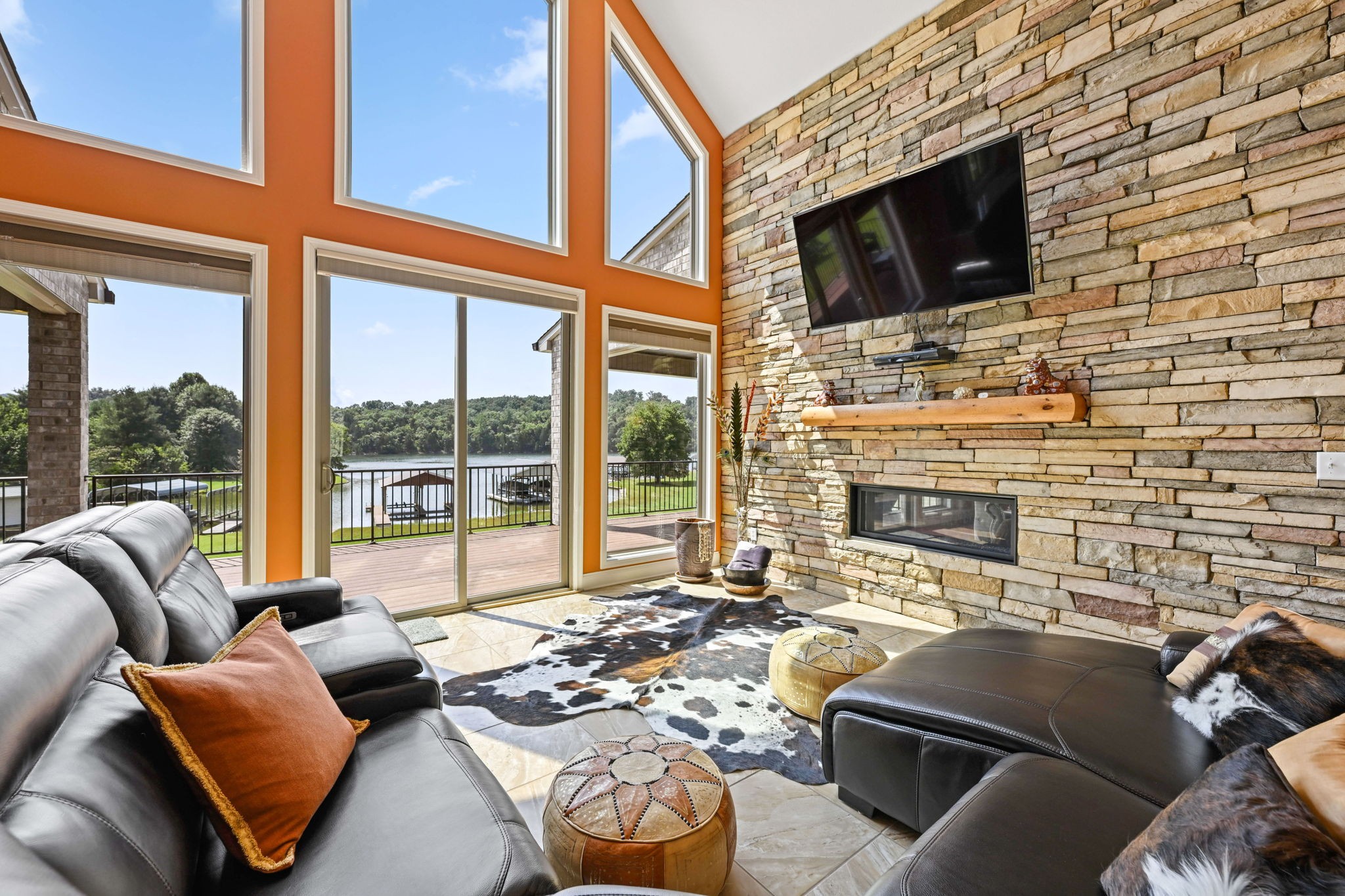 850 Sable Road Spring City, TN 37381 - Photo 18 of 56 a living room with furniture a flat screen tv and a fireplace