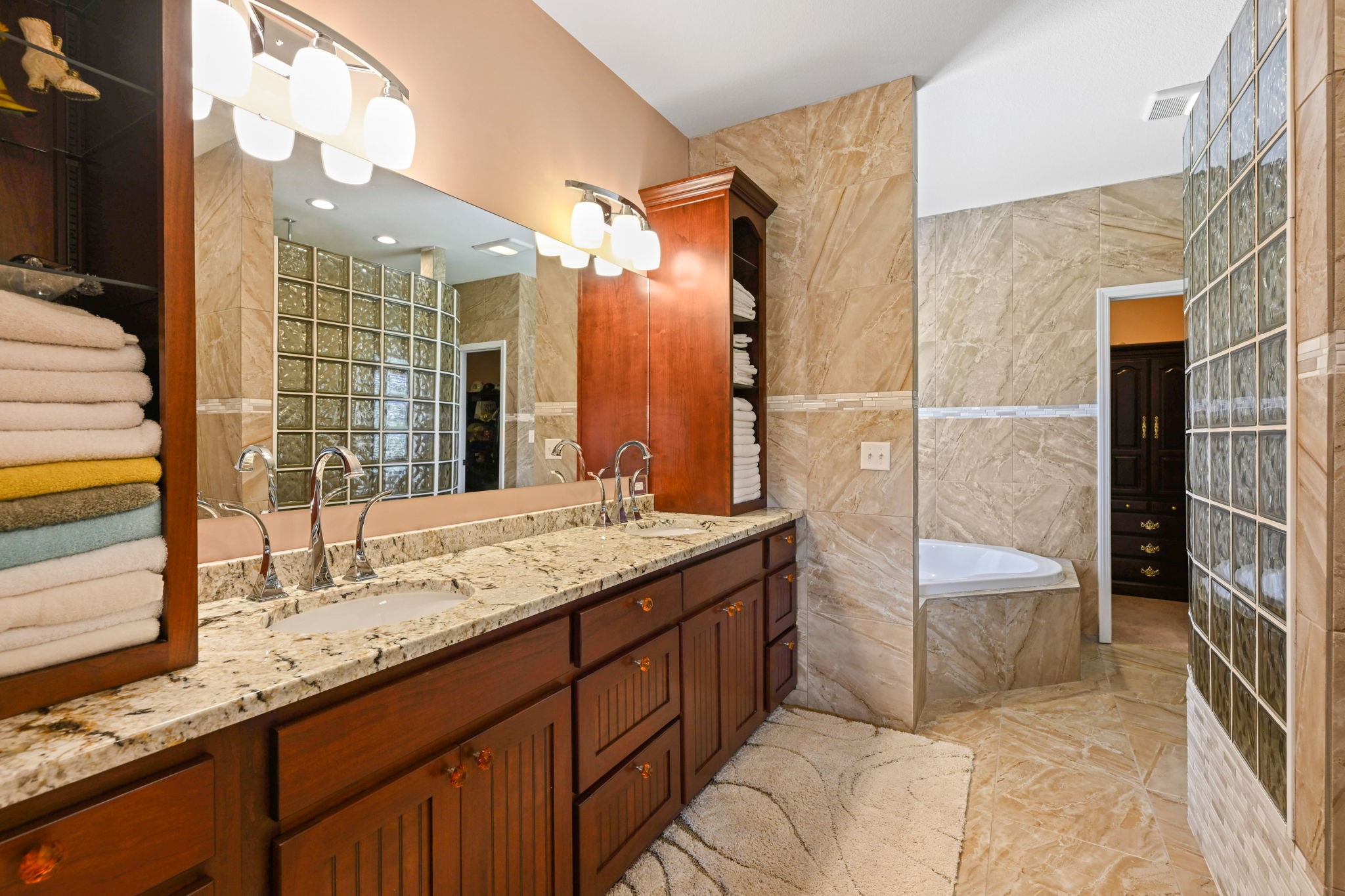 850 Sable Road Spring City, TN 37381 - Photo 25 of 56 a bathroom with a granite countertop sink and a mirror