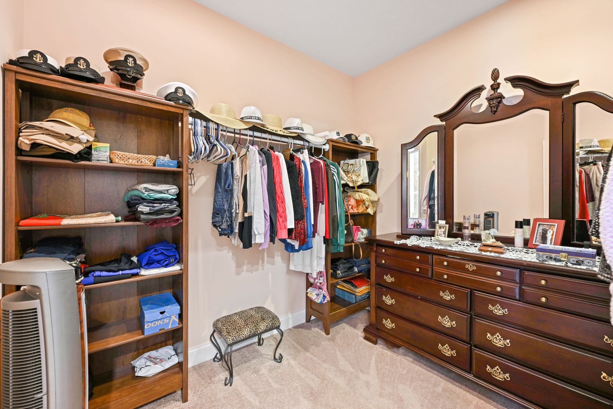 850 Sable Road Spring City, TN 37381 - Photo 27 of 56 a view of walk in closet with clothes and shoes