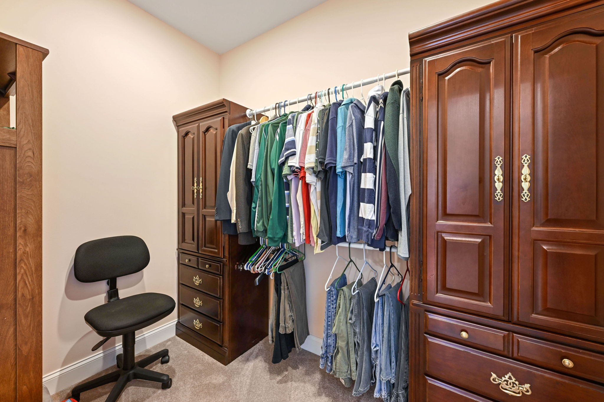 850 Sable Road Spring City, TN 37381 - Photo 28 of 56 a view of walk in closet with clothes and shoes