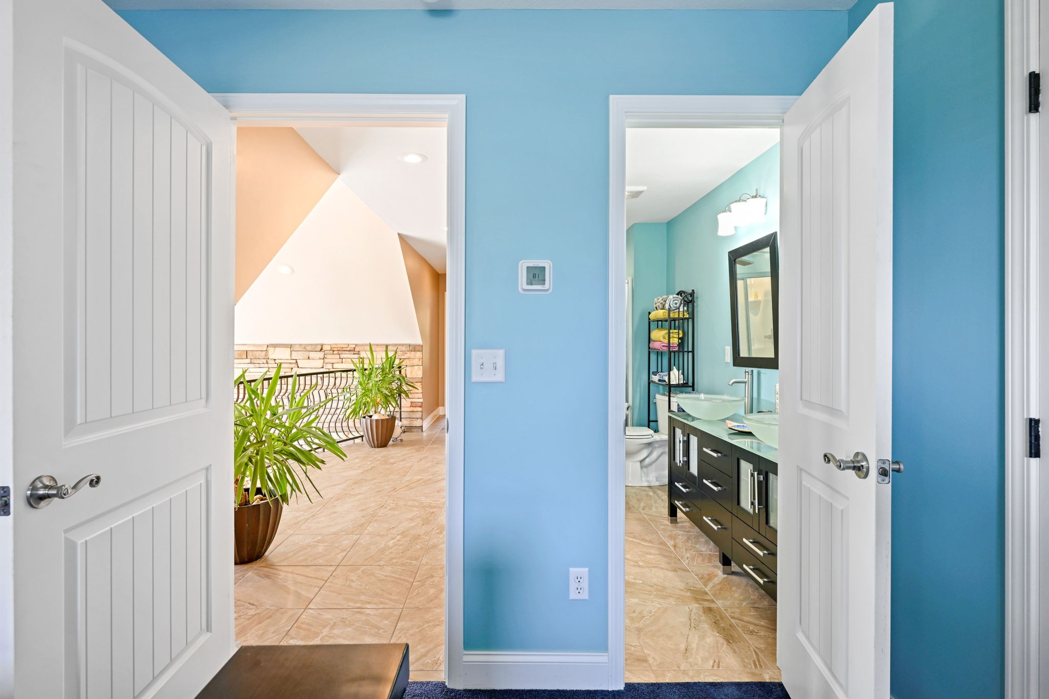 850 Sable Road Spring City, TN 37381 - Photo 31 of 56 a view of a hallway with wooden floor and a bathroom