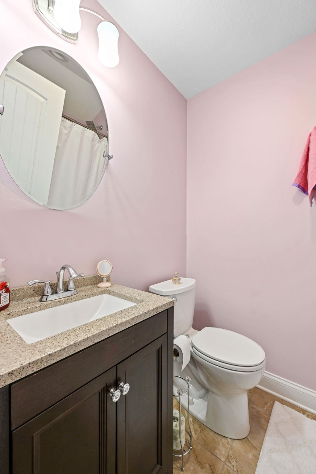 850 Sable Road Spring City, TN 37381 - Photo 36 of 56 a bathroom with a granite countertop toilet sink and mirror
