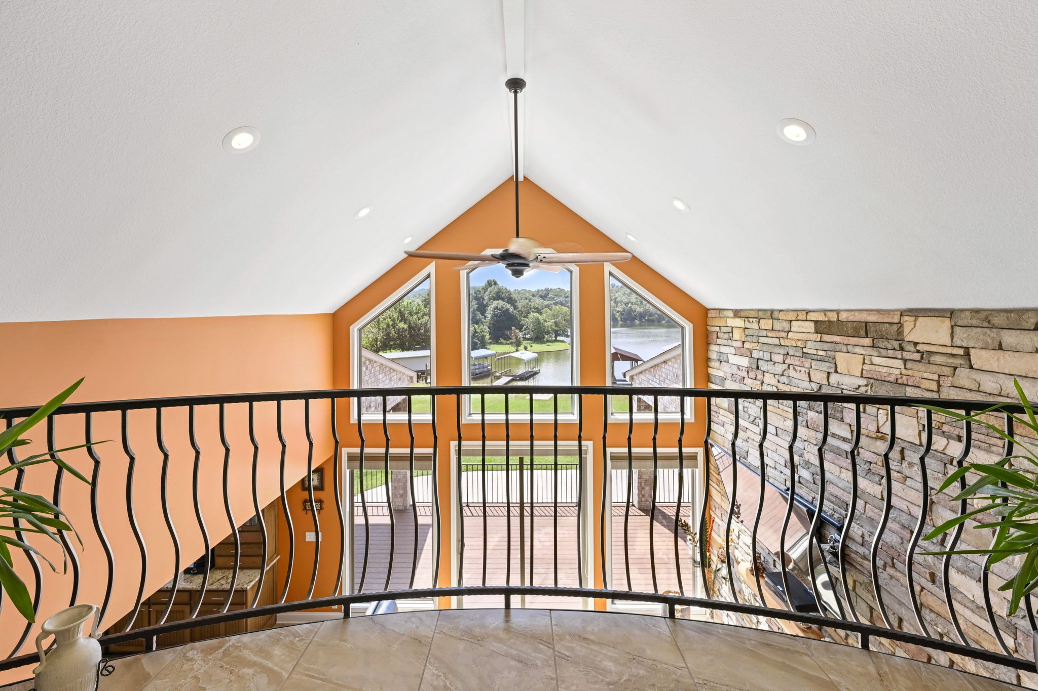 850 Sable Road Spring City, TN 37381 - Photo 38 of 56 a view of staircase with a floor to ceiling window and stairs