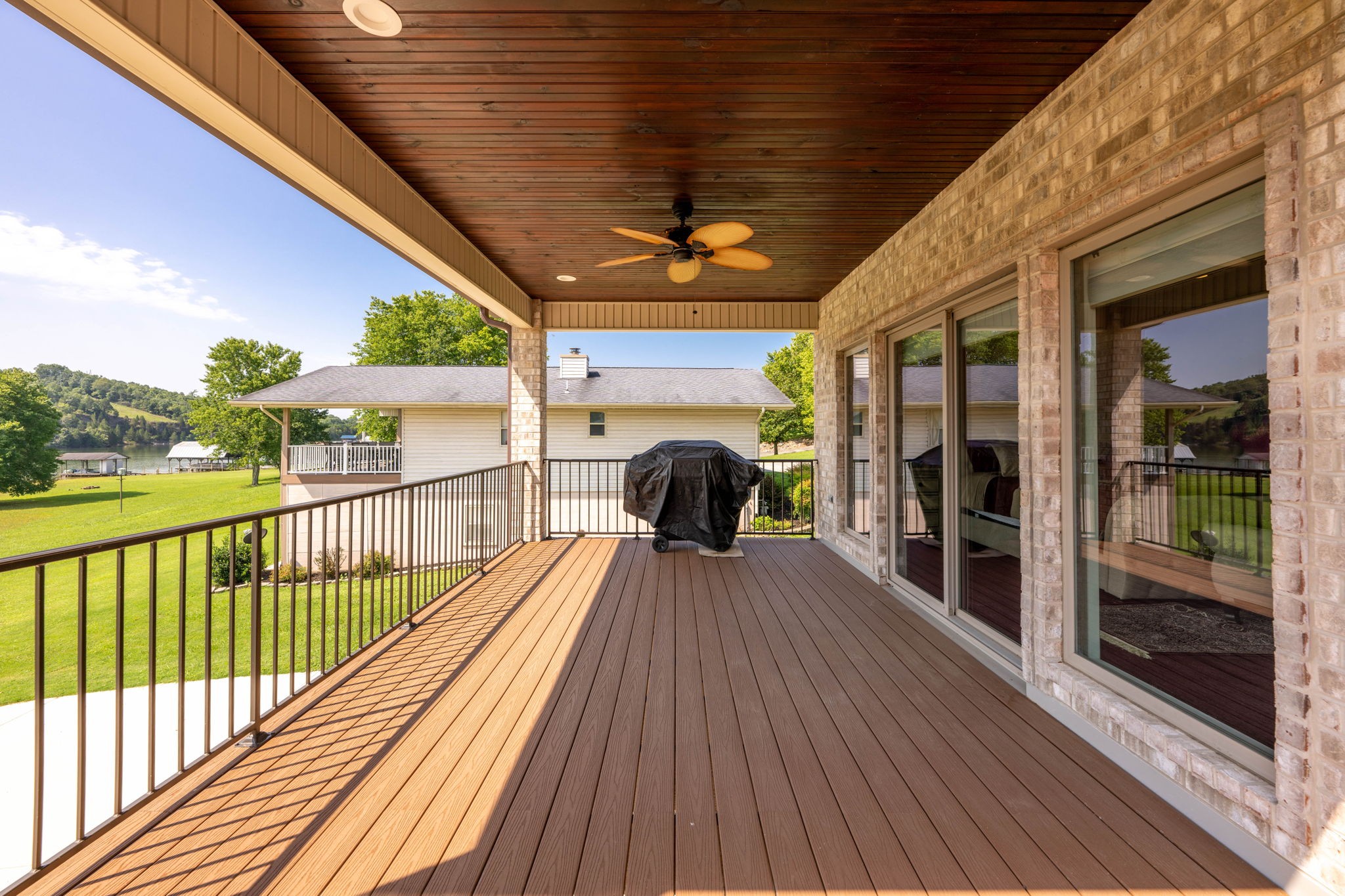 850 Sable Road Spring City, TN 37381 - Photo 44 of 56 a view of a porch with wooden floor