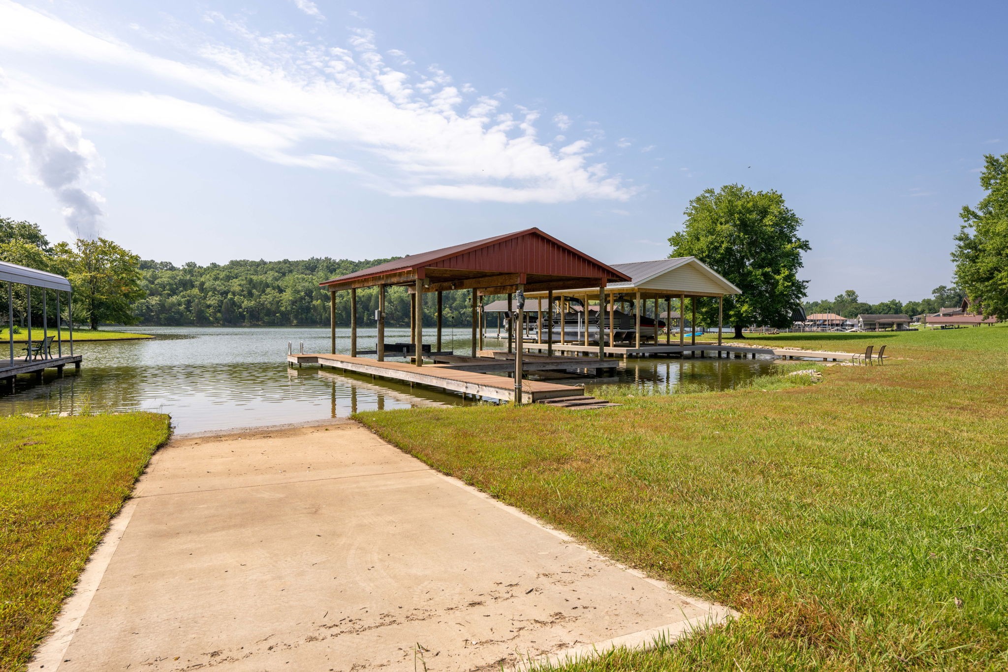 850 Sable Road Spring City, TN 37381 - Photo 53 of 56 a view of a swimming pool with lounge chairs in front of house