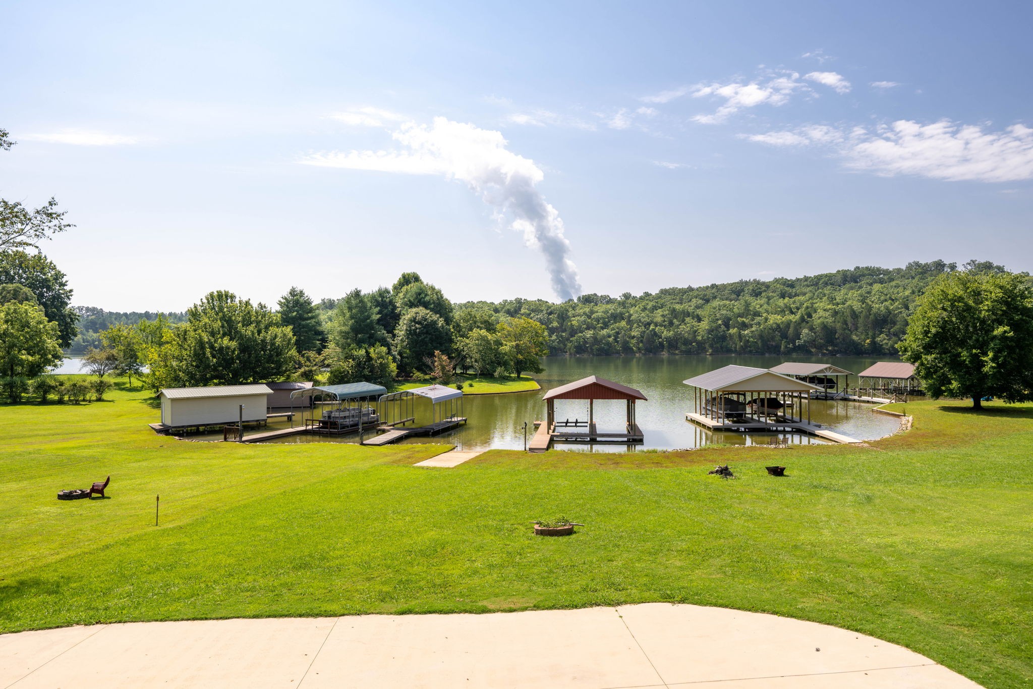 850 Sable Road Spring City, TN 37381 - Photo 55 of 56 a view of a lake with sitting area