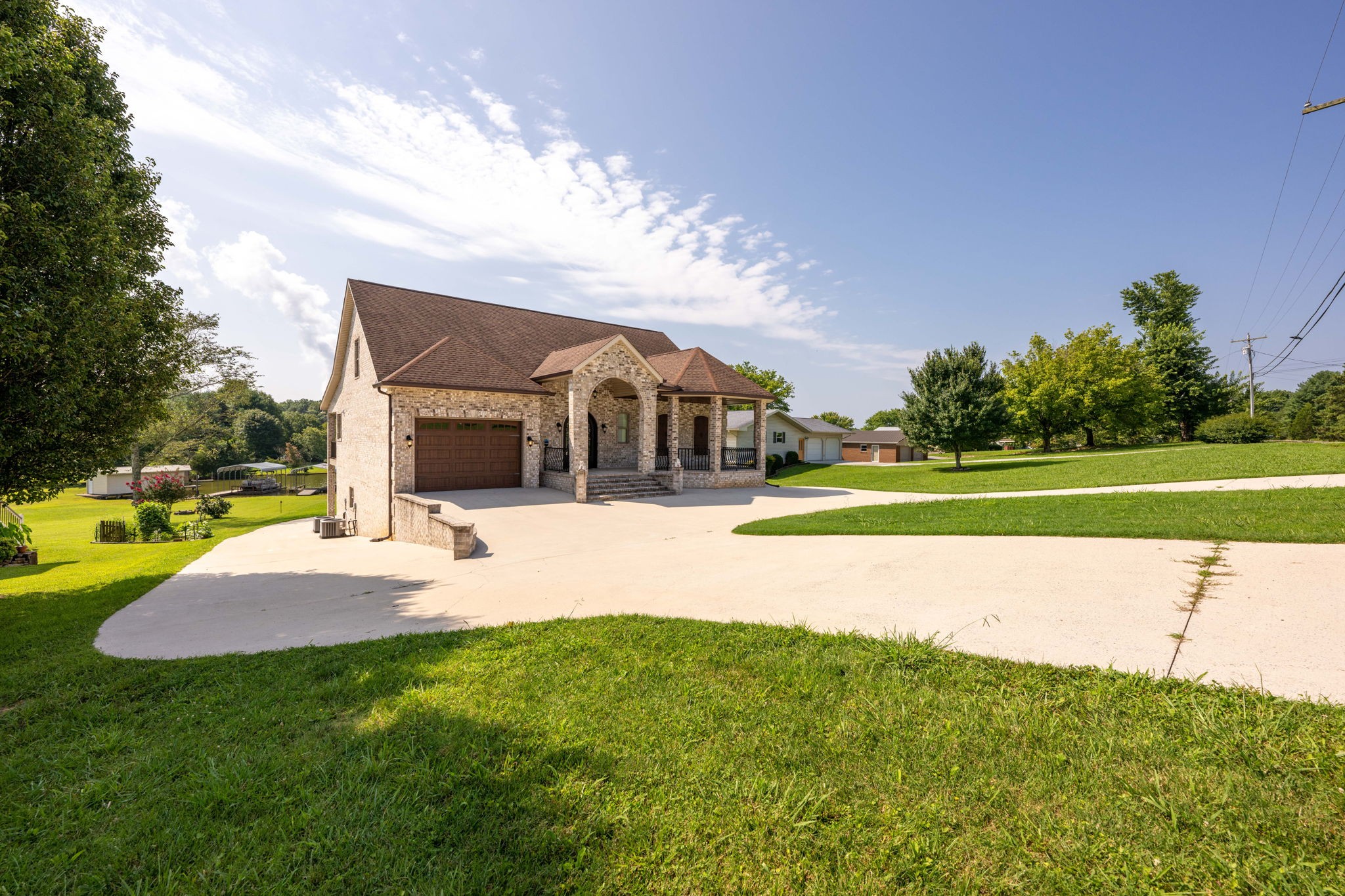 850 Sable Road Spring City, TN 37381 - Photo 56 of 56 a view of a house with swimming pool and a yard